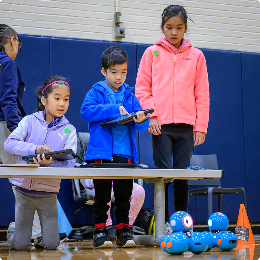Students working with robotics